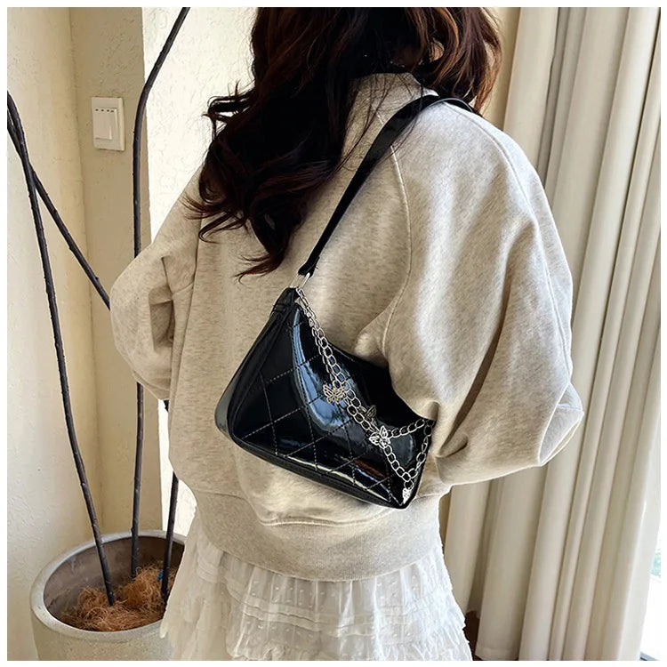 Bolso Nocturna con Cadenas Y mariposas.