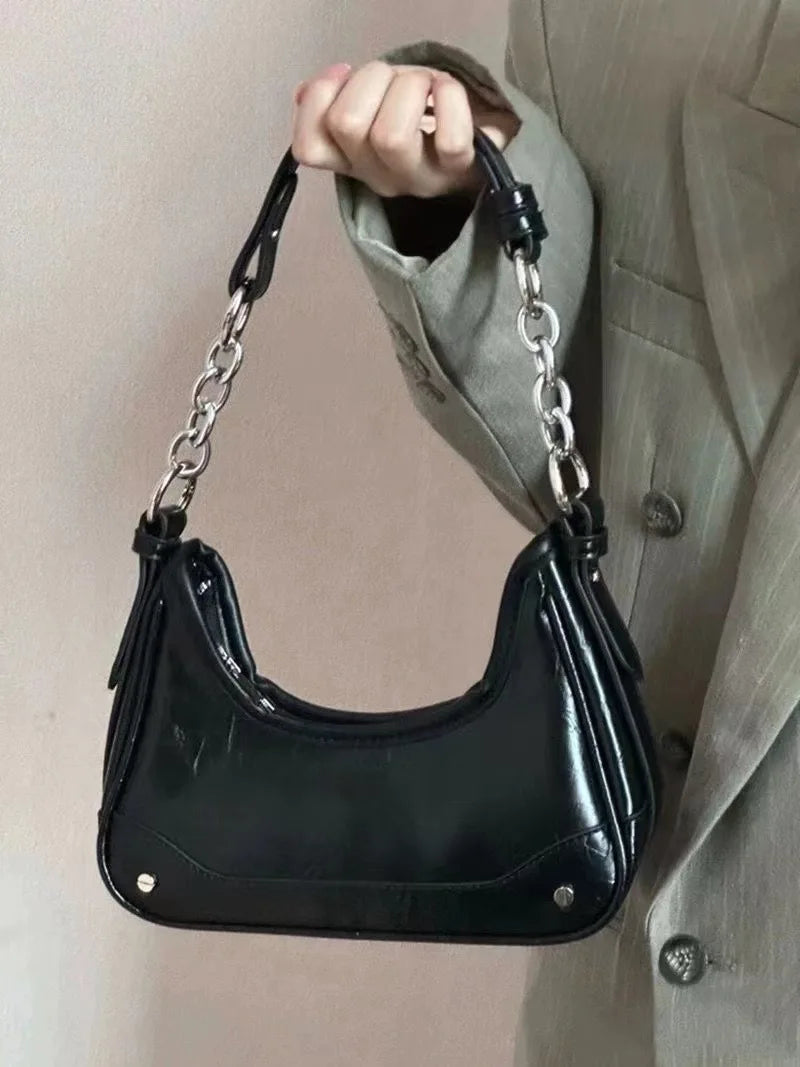 Bolso Bandolera Chain color Negro y plateado.
