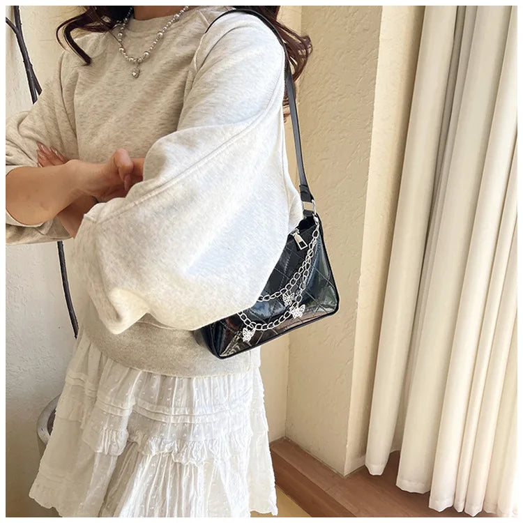 Bolso Nocturna con Cadenas Y mariposas.