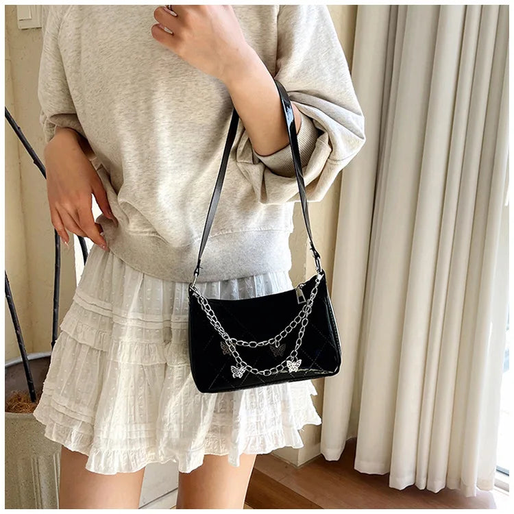 Bolso Nocturna con Cadenas Y mariposas.